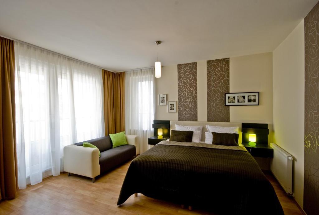 Corvin Lux Aparthotel Budapeste Quarto foto